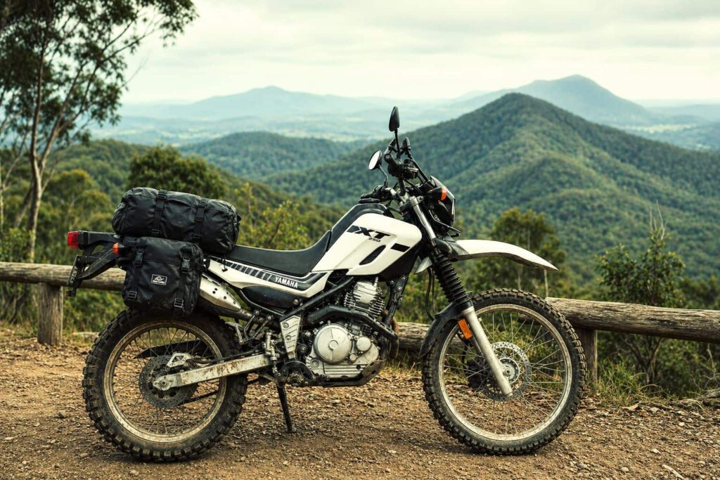 YAMAHA XT250 motorbike rental byron bay - shot of bike with byron hinterland in background